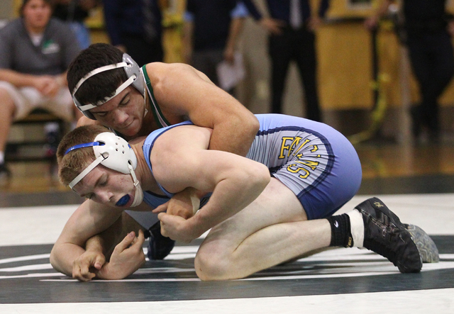 Green Valley’s Donovan Peek holds down Foothill’s Steven Thomas during the 160-p ...