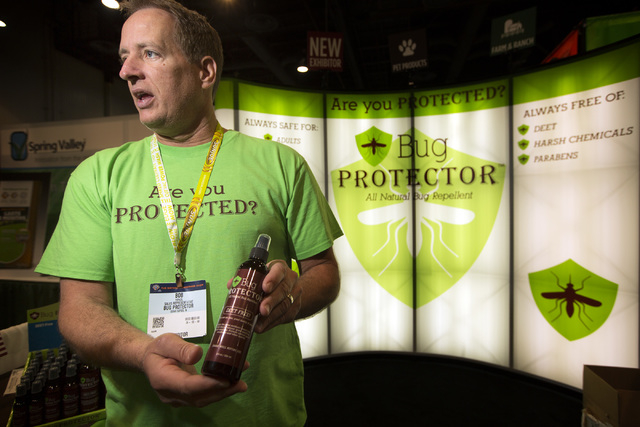 Sales representative Bob Porazil explains the Bug Protector, an all natural  bug repellant, Friday, May 6, 2016, at the 71st National Hardware Show in  the Las Vegas Convention Center. Jeff Scheid/L …