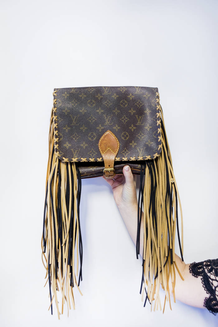 New Vintage rehabs old handbags with fringe, feathers and TLC