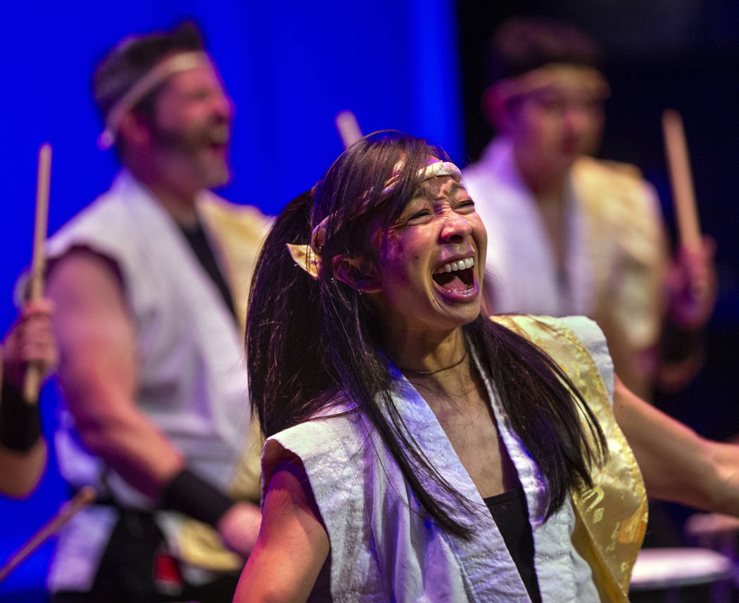 Jen Kong with Korabo yells while performing the traditional Japanese art form of taiko for a pa ...