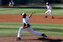 Desert Oasis pitcher Aaron Roberts (25) throws against Bishop Gorman in the fourth inning of ...