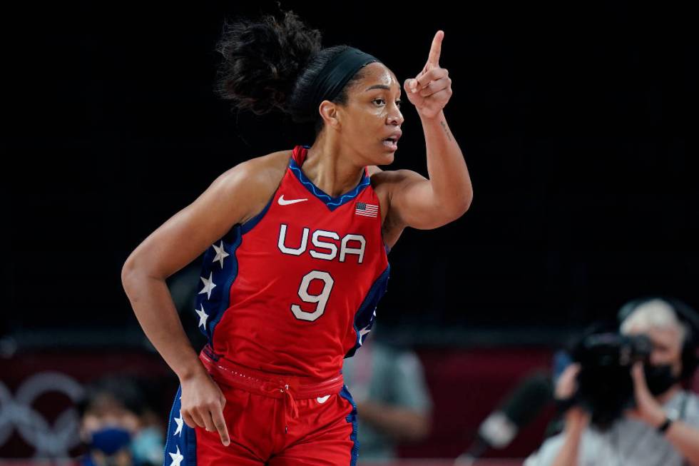 United States's A'Ja Wilson (9) reacts aft  scoring against Australia during a women's basketb ...