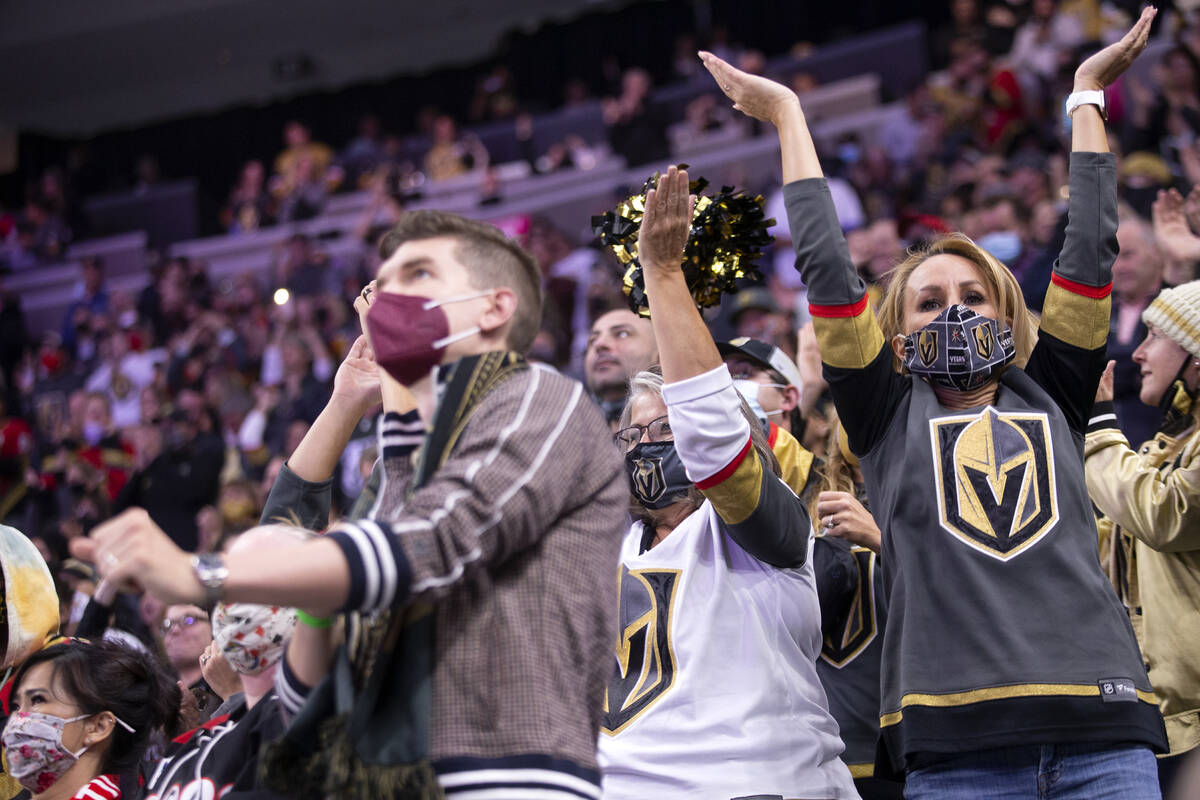 Chicago Blackhawks fan wearing headdress shocks hockey fans