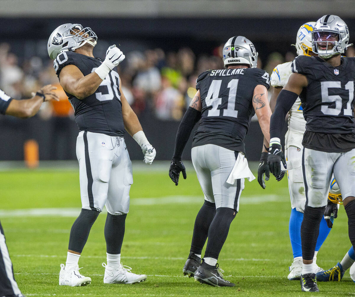 Raiders defensive tackle Jerry Tillery (90) celebrates a sack on Los Angeles Chargers quarterba ...