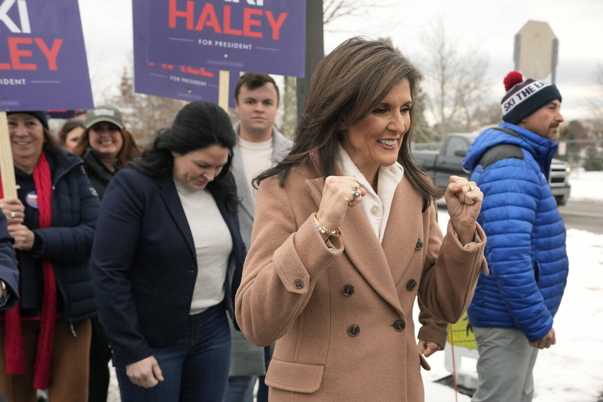 Republican presidential candidate former U.N. Ambassador Nikki Haley gestures while walking wit ...