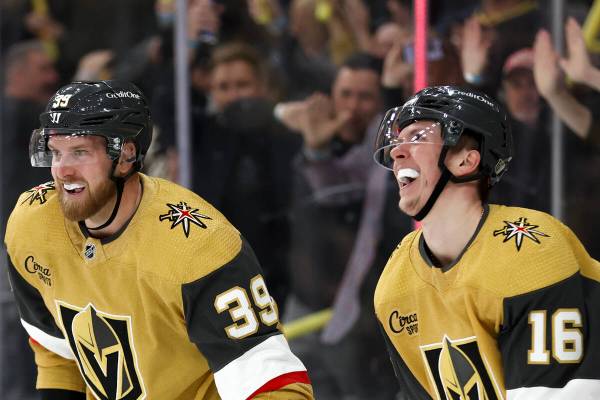 Golden Knights right wing Anthony Mantha (39) and left wing Pavel Dorofeyev (16) celebrate afte ...