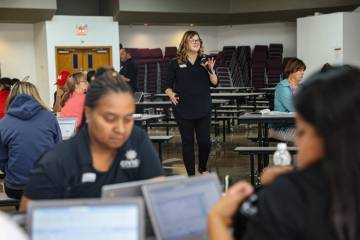 Sarah Swallia, an instructor with Curriculum Associates, leads a back-to-school training sessio ...