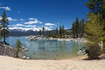 The popular Sand Harbor beach on Lake Tahoe's pristine northeastern banks will begin implementi ...