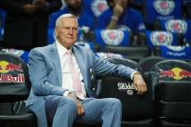 Jerry West sits on the bench before an NBA basketball game between the Los Angeles Clippers and ...